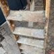 Antique authentic painter's stepladder in vintage patinated wood