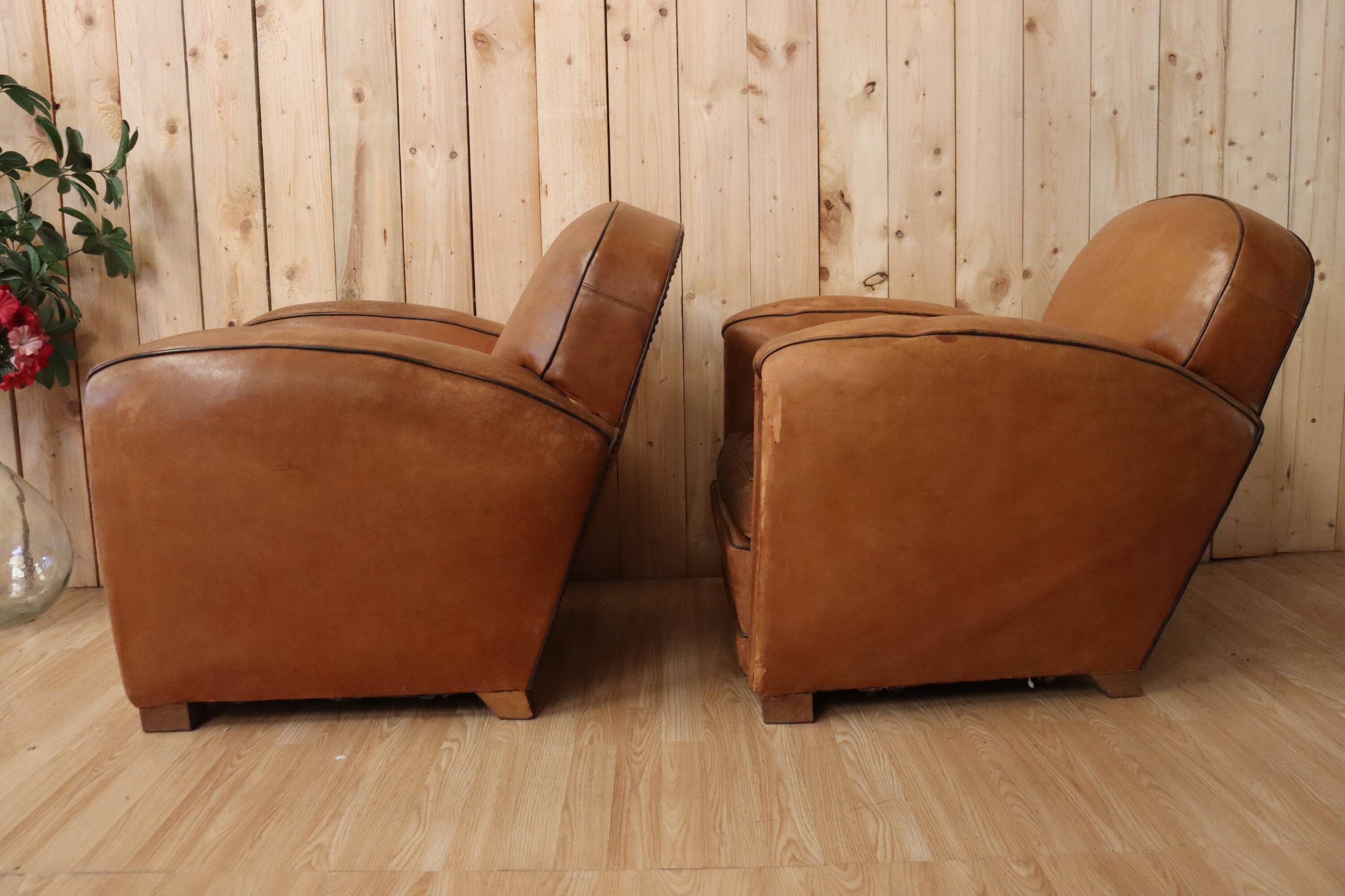 Pair of Art Deco leather club armchairs from the 1930s.