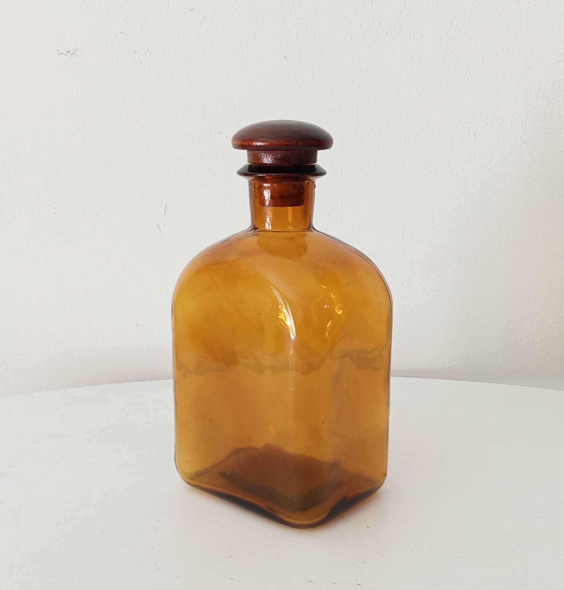 Vintage amber glass apothecary bottle