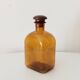 Vintage amber glass apothecary bottle