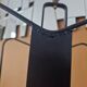 Jacques Adnet (1900-1984) - Black lacquered metal and brass magazine rack