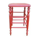 High stool in turned wood