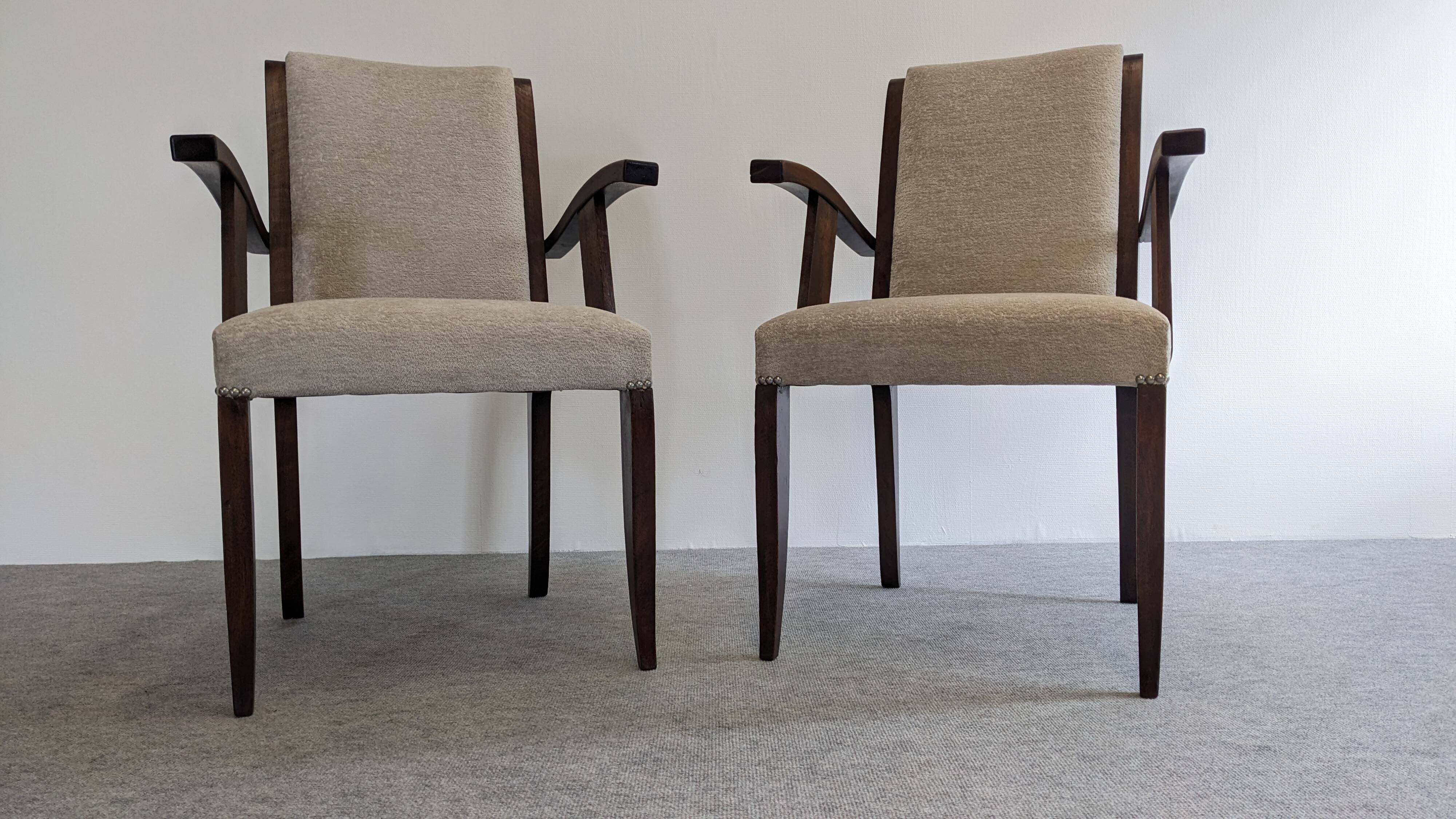 Pair of modernist mahogany bridge chairs from the 1940s/1950s