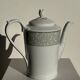 Bavarian porcelain teapot from Germany with blue frieze and flower lid H23