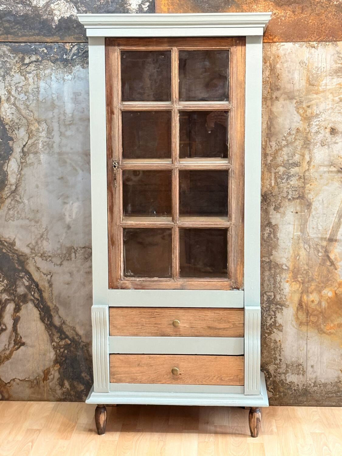 Raw wood and celadon glass cabinet