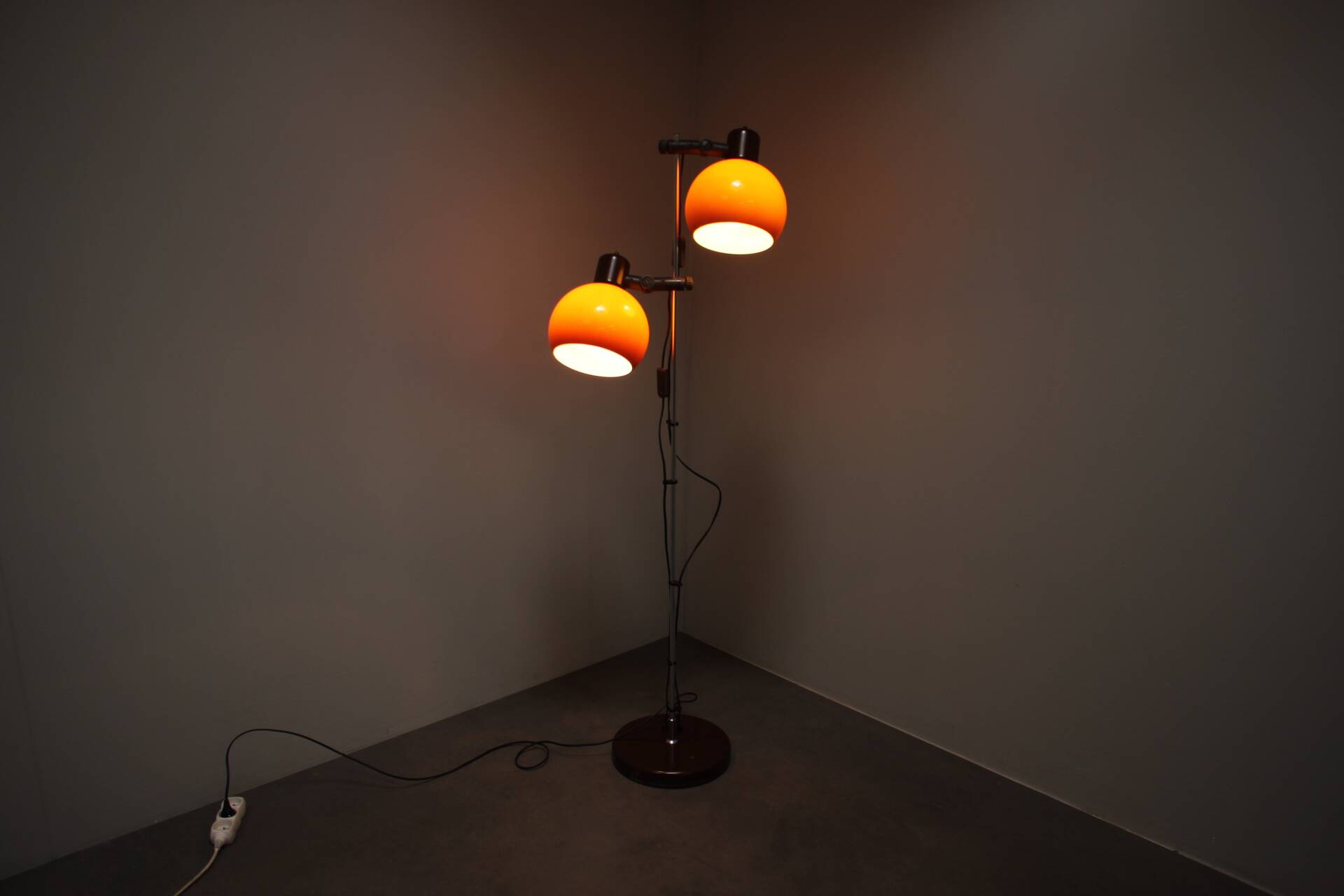 Vintage Hungarian adjustable floor lamp with two orange globe shades, circa 1970.