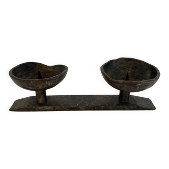 Wrought iron candlestick in brutalist style