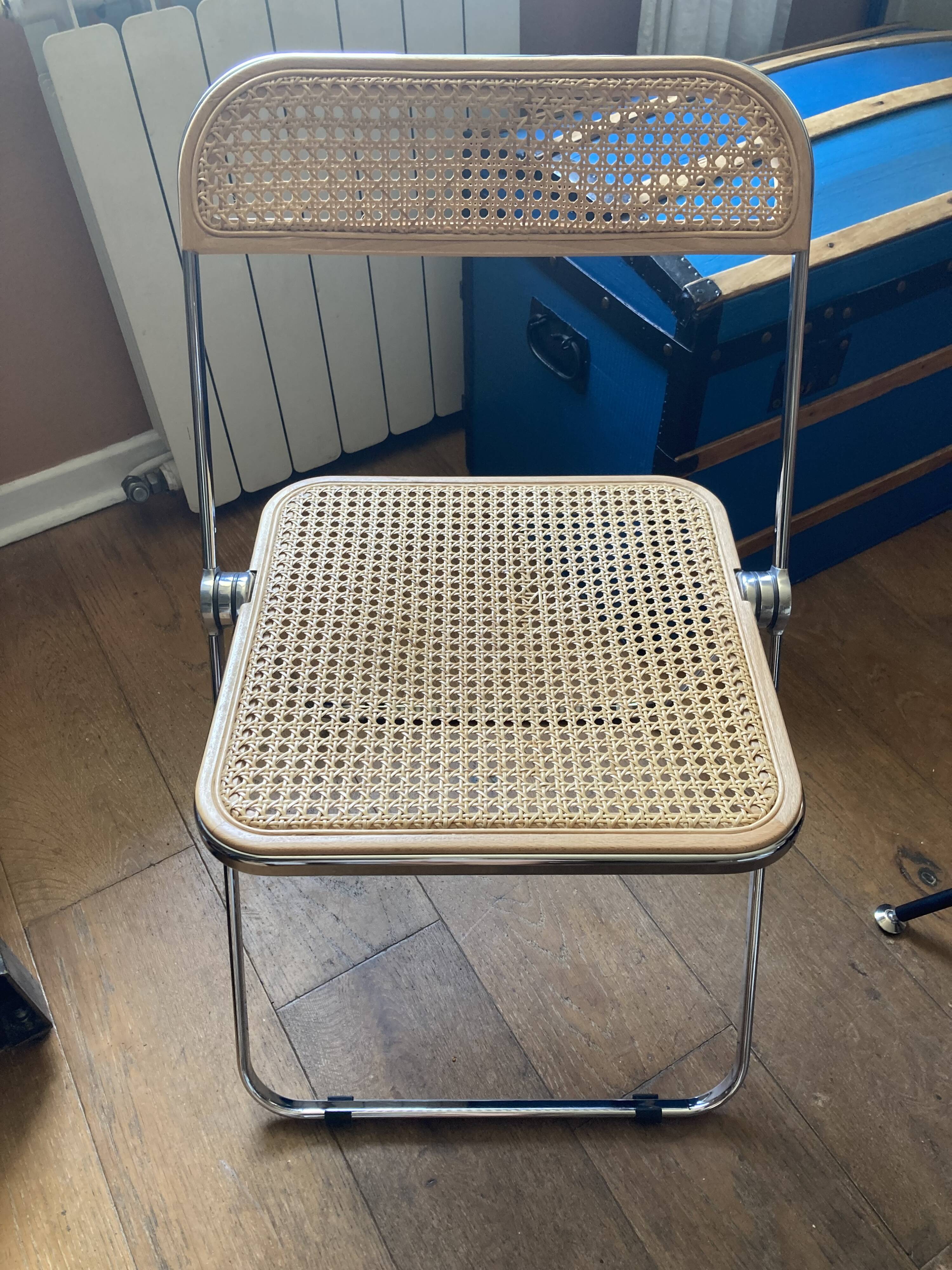 Plia chairs by Castelli in wood and cane.