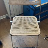 Plia chairs by Castelli in wood and cane.