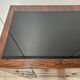 1940s Art Decò chest of drawers in walnut burl with black glass top