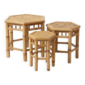 Set of three vintage rattan side tables.
