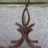 pair of andirons attributed to Raymond Subes, flame model