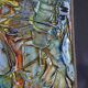 Framed abstract painting under glass