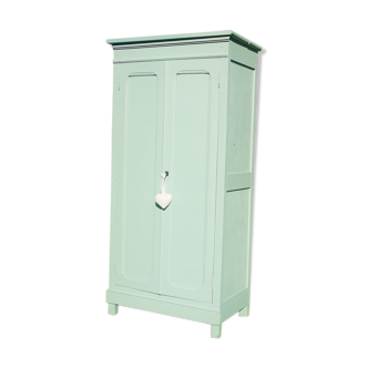 Parisian wardrobe in vintage green wood