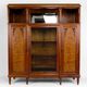 Art Deco showcase bookcase in carved walnut, France, circa 1925