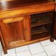 Sideboard with half-columns in walnut, Empire period.