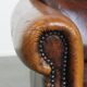 Fauteuil vintage en cuir de mouton avec dossier haut