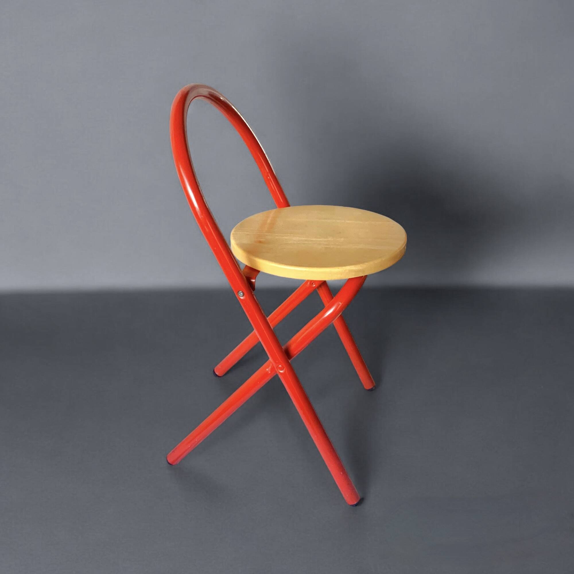Vintage folding chair in red painted metal and wood