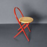 Vintage folding chair in red painted metal and wood