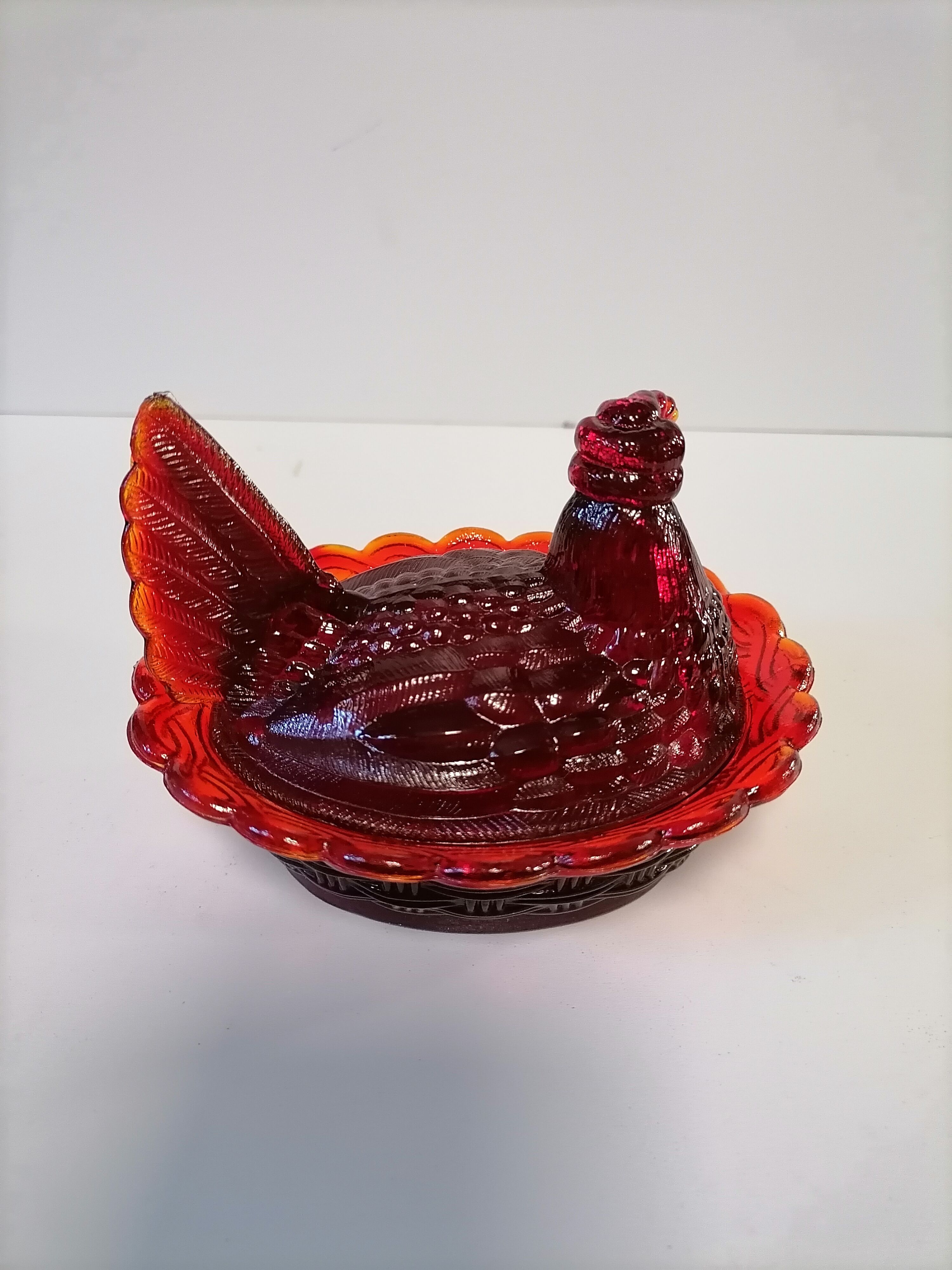Poule en verre orangé sucrier