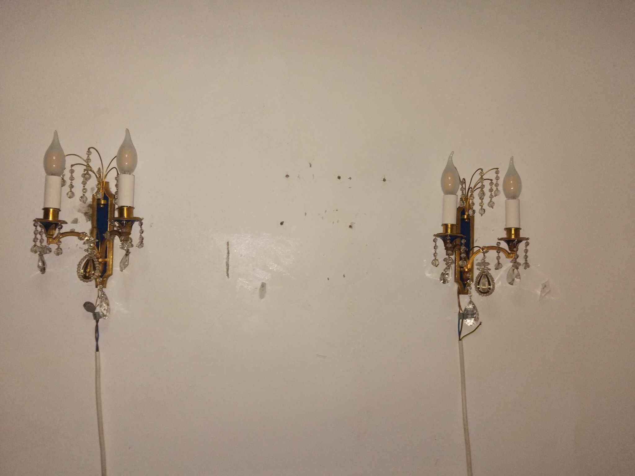 Pair of Louis XVI style gilt bronze wall lights