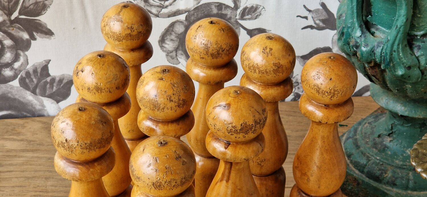 Games of 9 wooden skittles and 2 balls