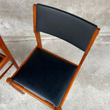 2 wooden and faux leather chairs in Scandinavian style