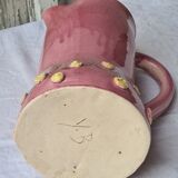 Glazed terracotta pitcher with mimosa decoration