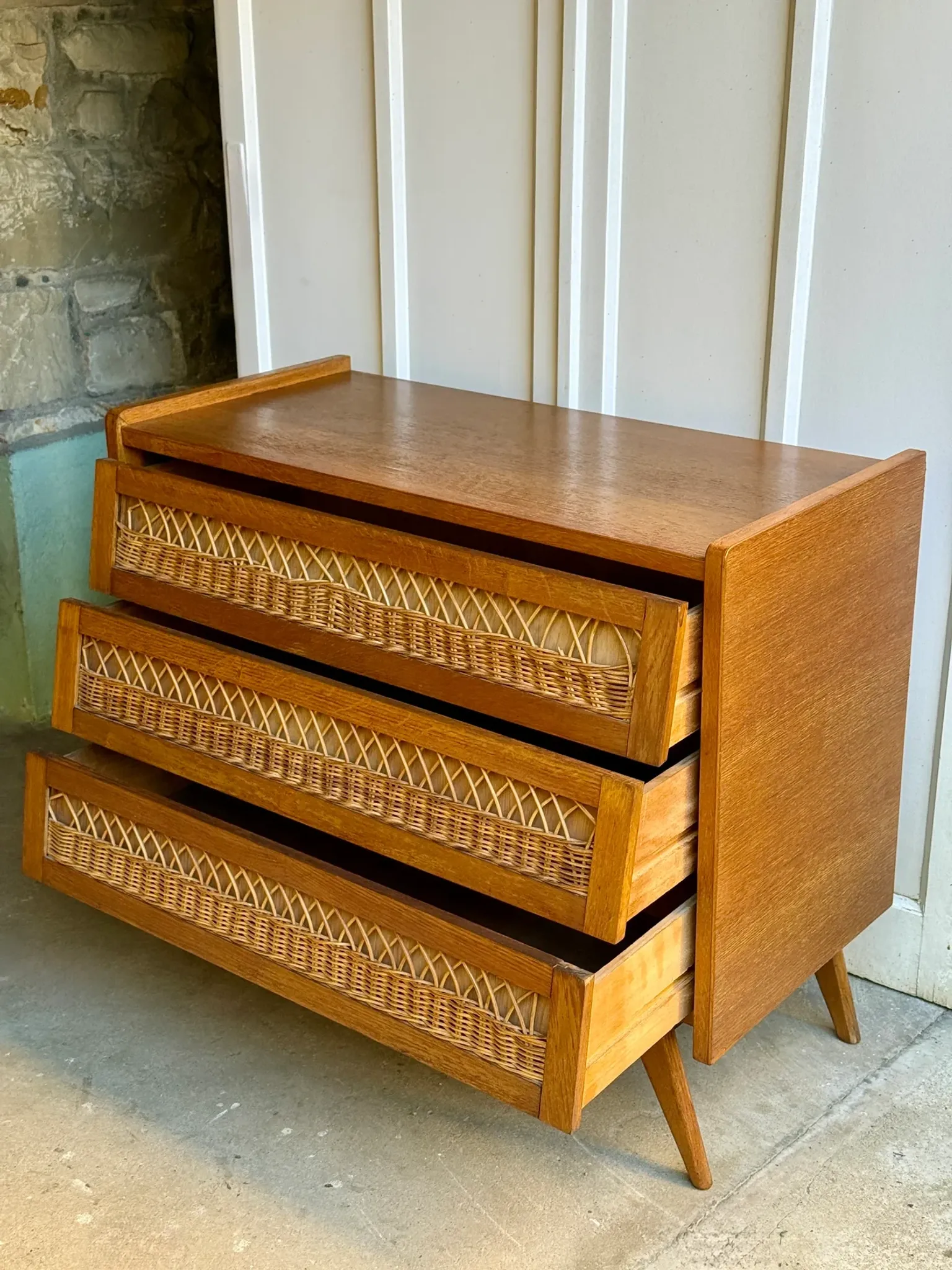 Scandinavian chest of drawers in oak and rattan from the 50s/60s.