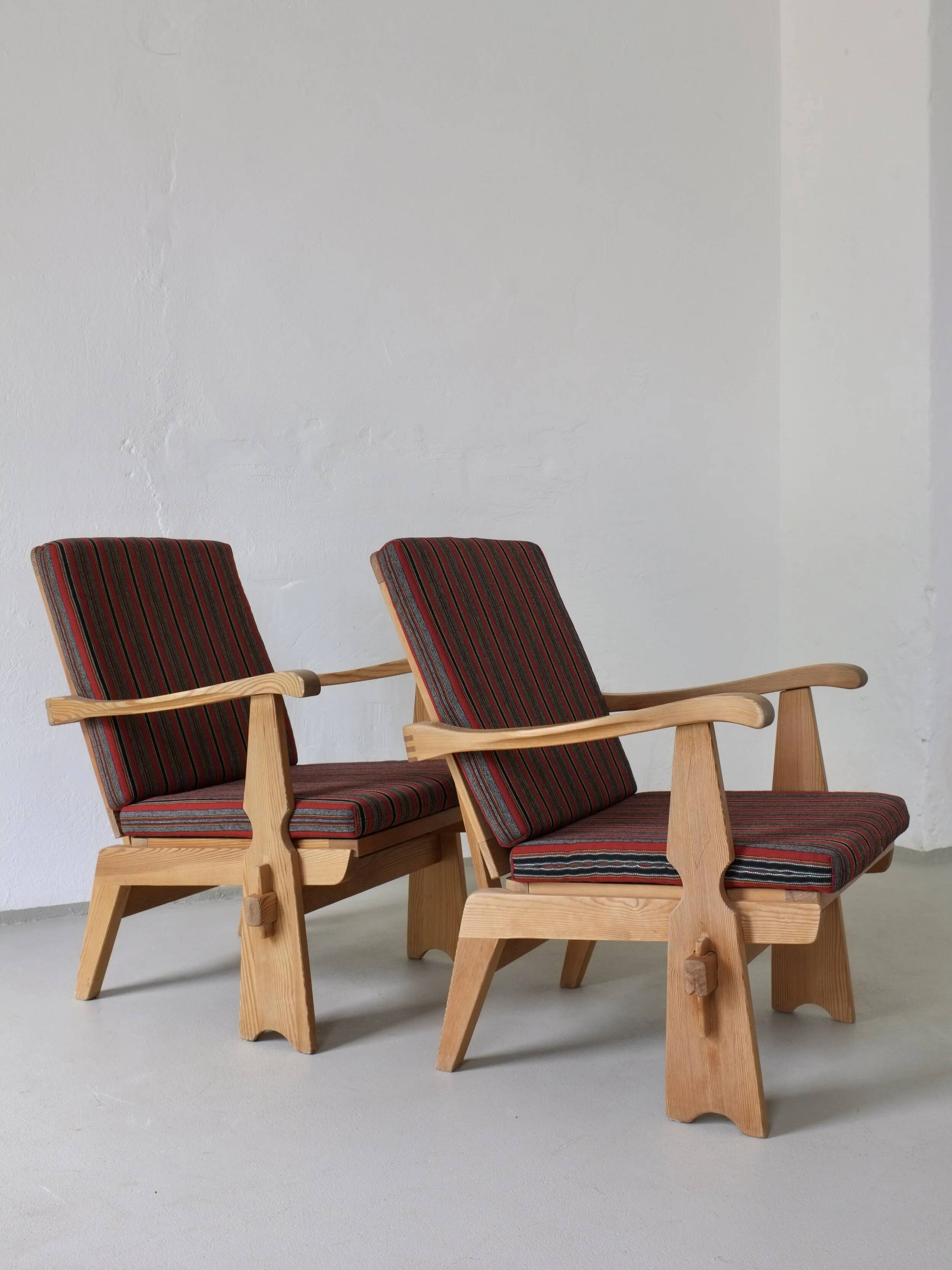 2 carved pine lounge chairs | Scandinavia | 1970s