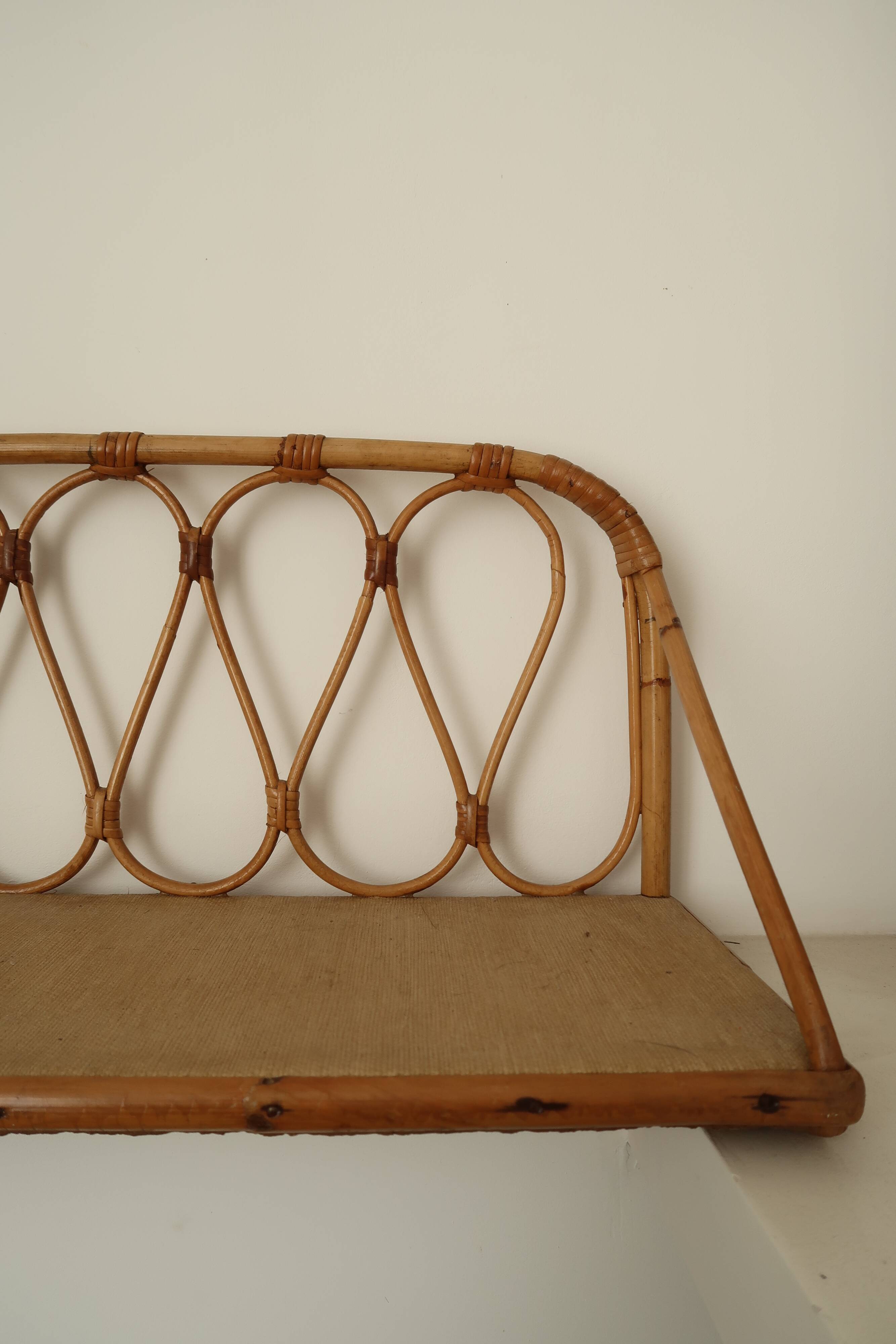 Pair of rattan wall shelves