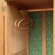 Parisian Art Deco wardrobe, renovated with raw wood.