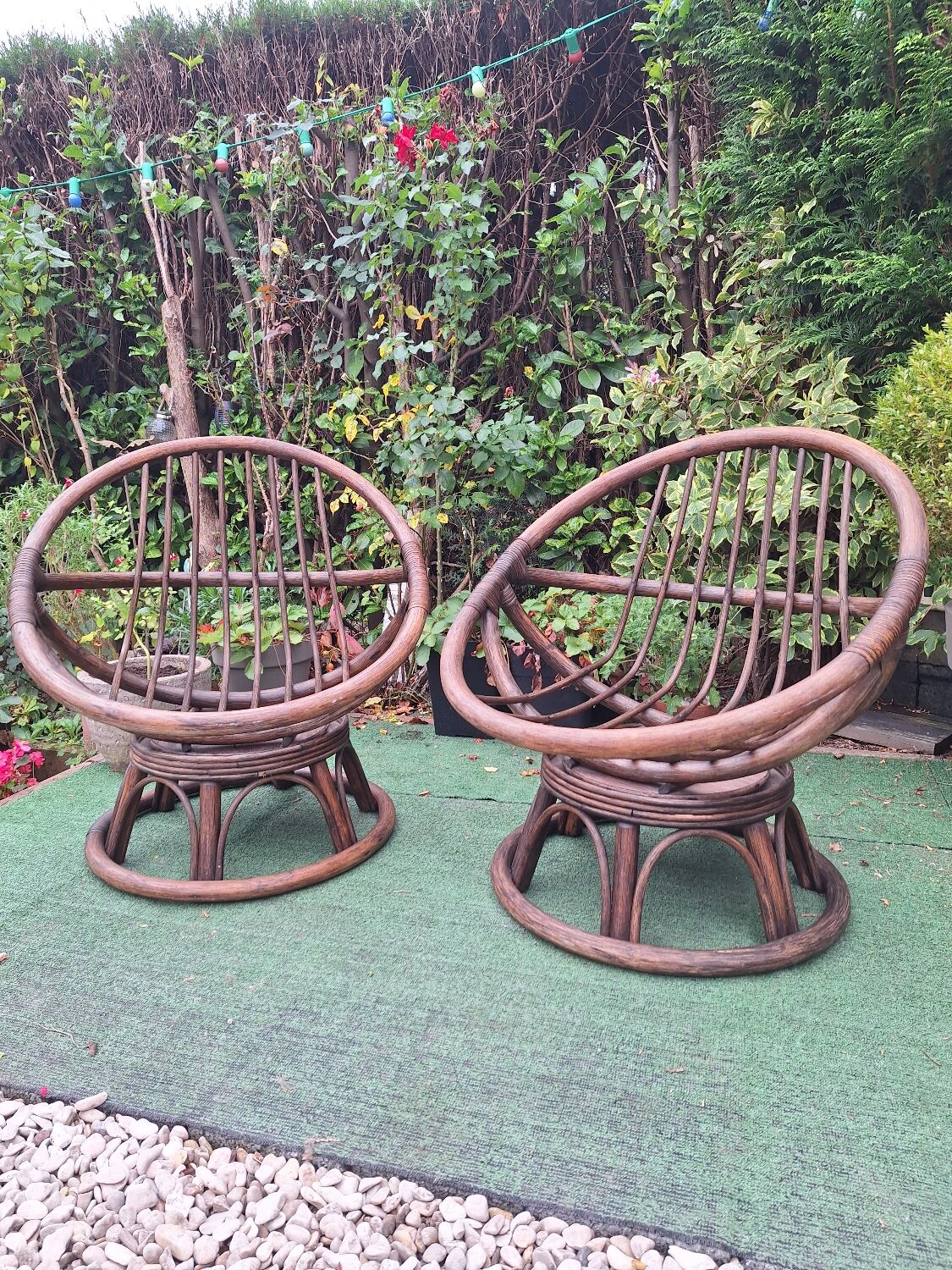 Pair of vintage rattan swivel armchairs