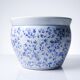 Vintage Chinese cache-pot in blue and white porcelain with a floral design.