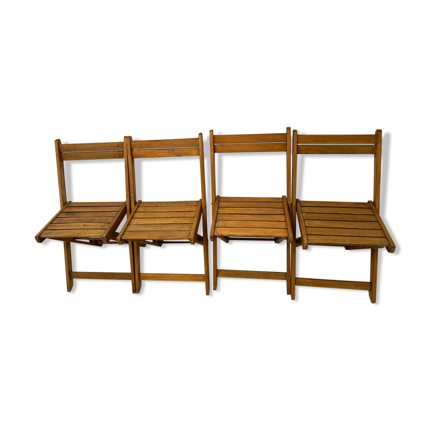 4 foldable chairs in vintage wood