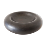 Empty round pocket in black ceramic