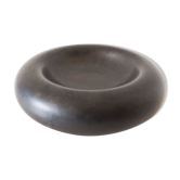 Empty round pocket in black ceramic