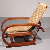 An exceptionally rare mahogany recliner crafted in Italy during the 1950s"
