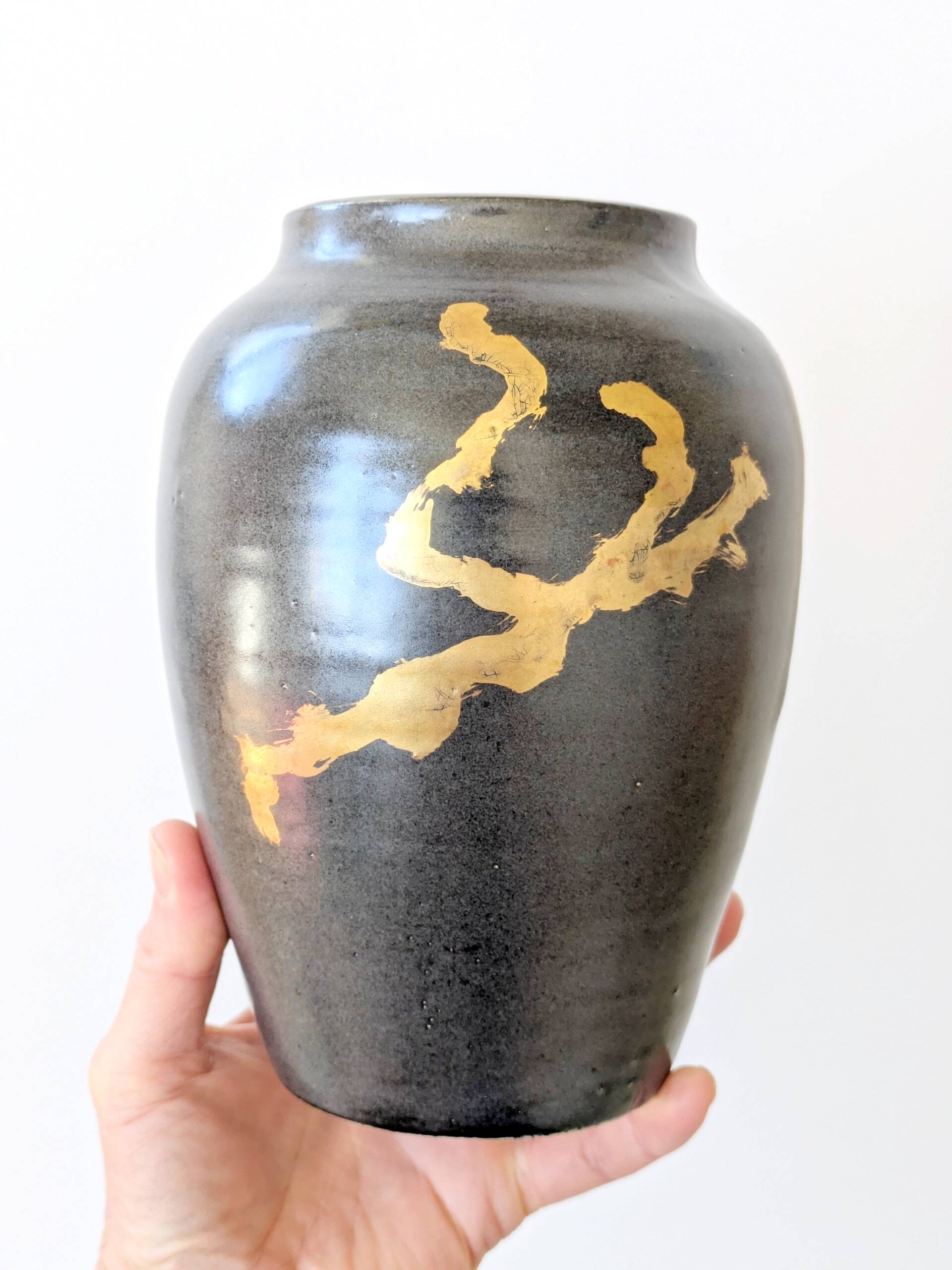 Vintage ceramic vase, black and gold, Japandi style