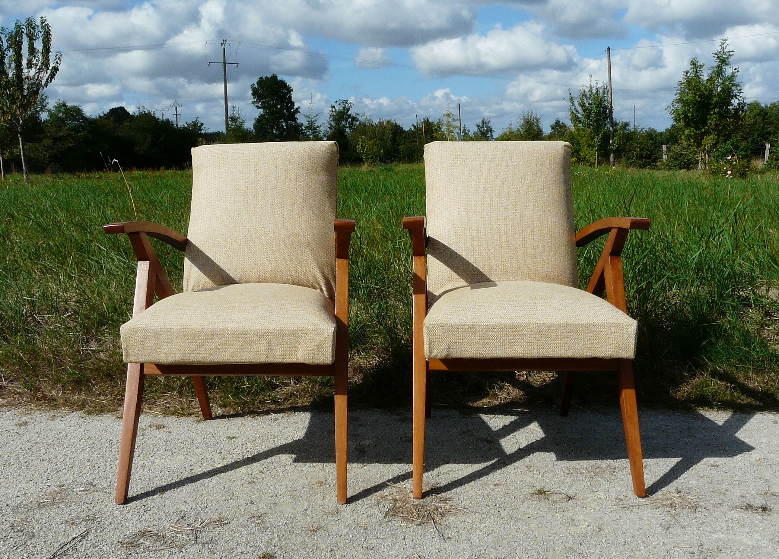 Pair of Scandinavian vintage armchairs in blond wood