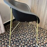 Designer armchair with a black shell – metal frame