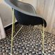 Designer armchair with a black shell – metal frame