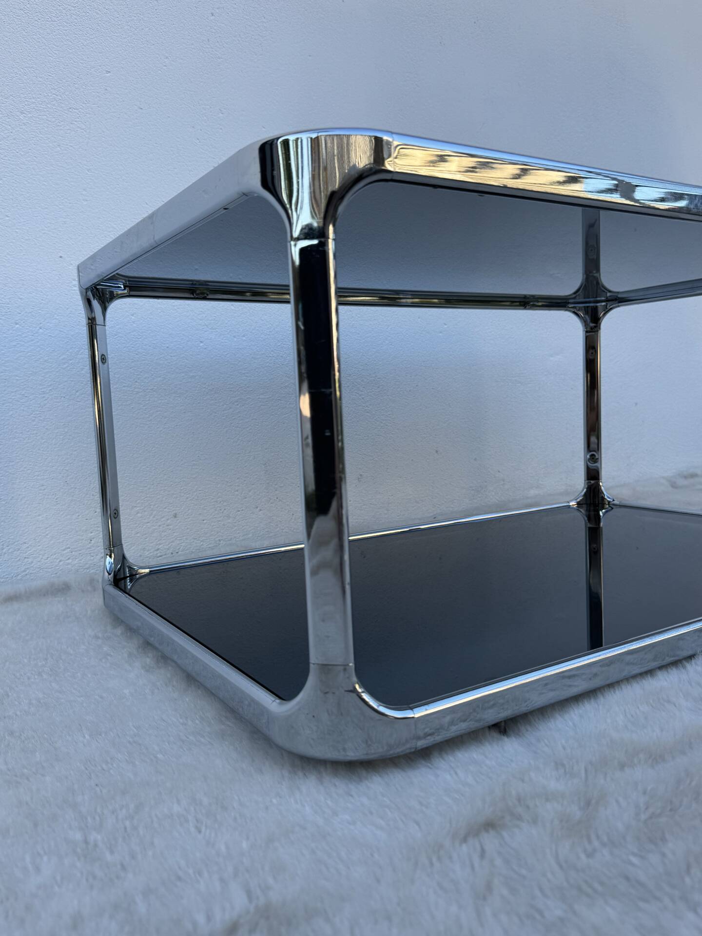 Chrome and smoked glass coffee table from the 1970s.