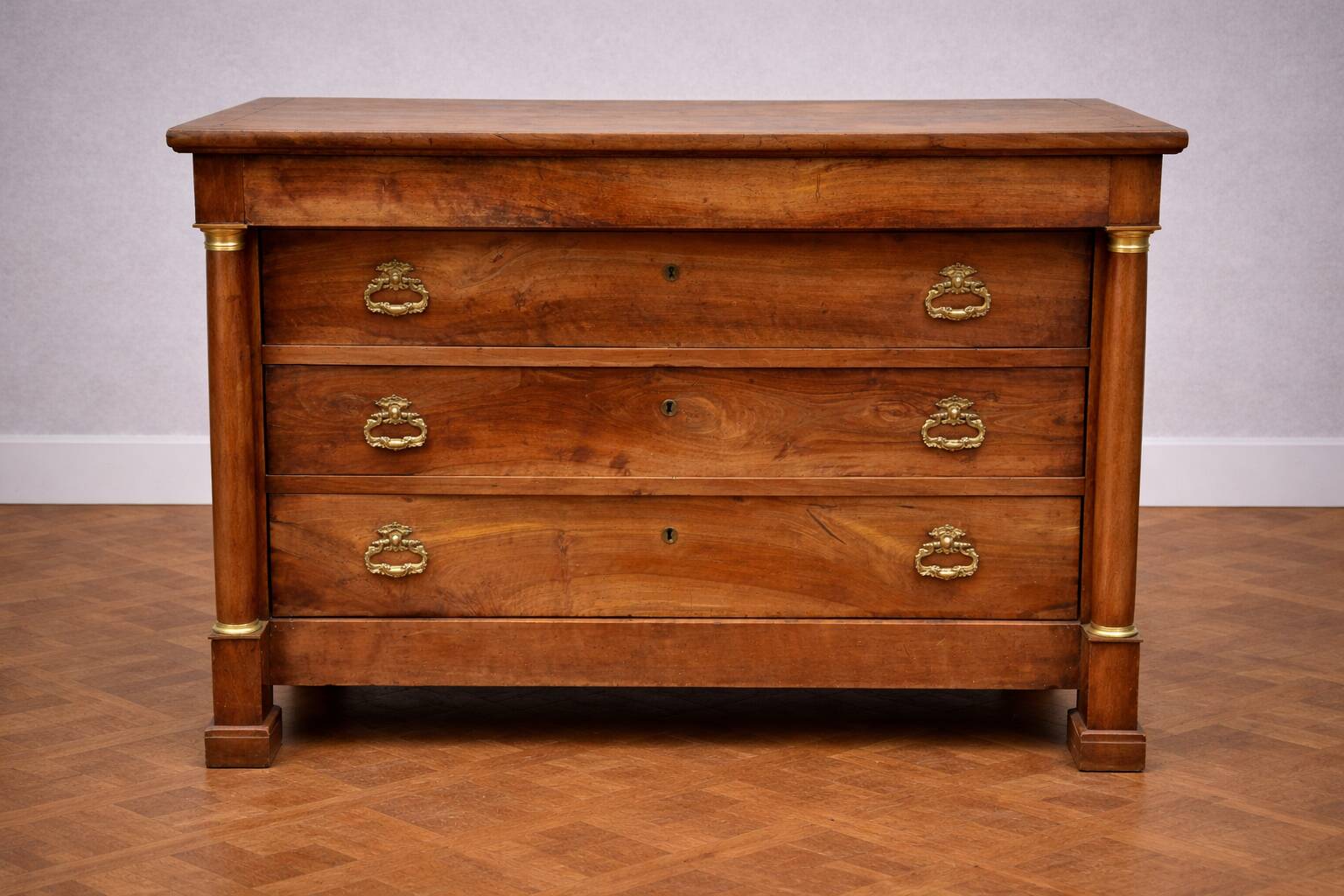 Empire walnut commode with detached columns – early 19th century