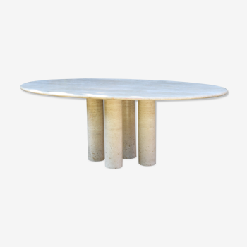 Mario Bellini's large oval dining room table in colonnata 2 travertine from the 70s