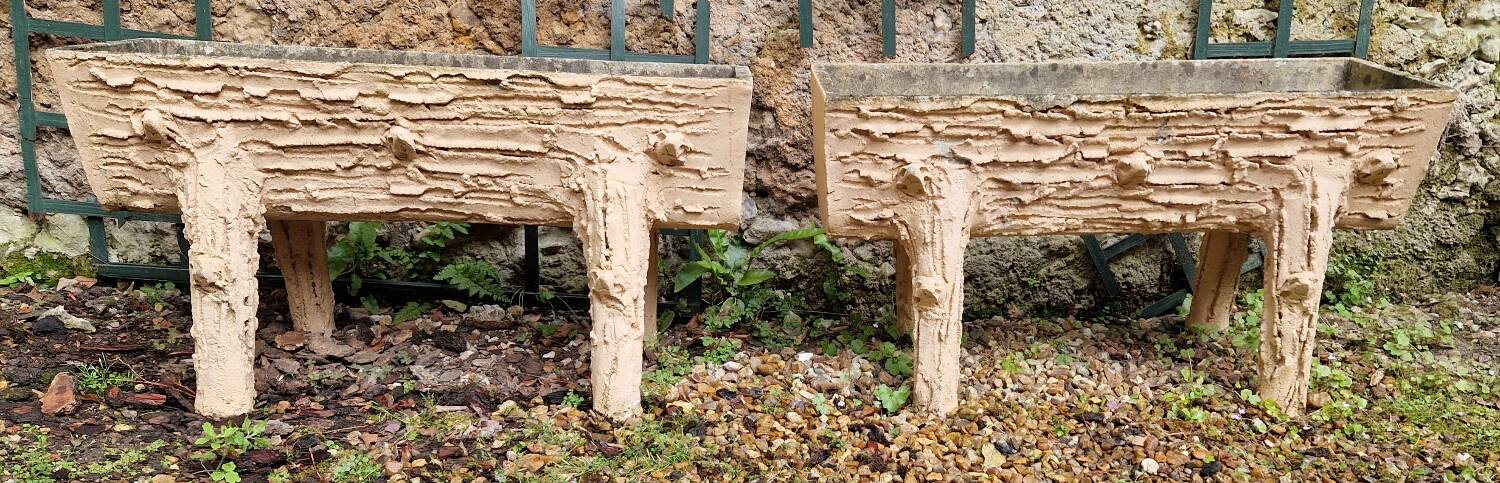 Pair of cement planters in faux wood finish