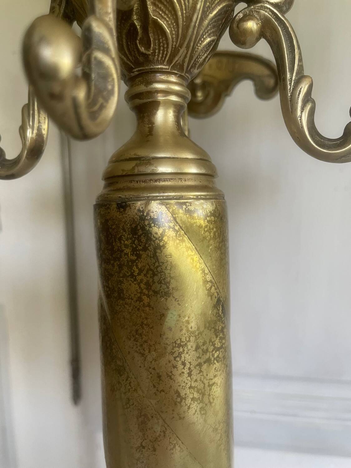 Freestanding brass coat rack