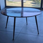 Vintage German round coffee table in sun veneer – W. Germany, an