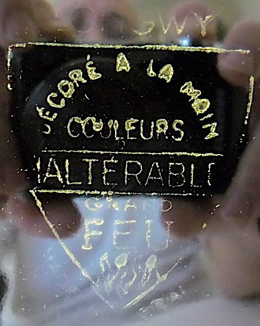 Pair of decorative plates: "Rally" & "Bal at the Opera".