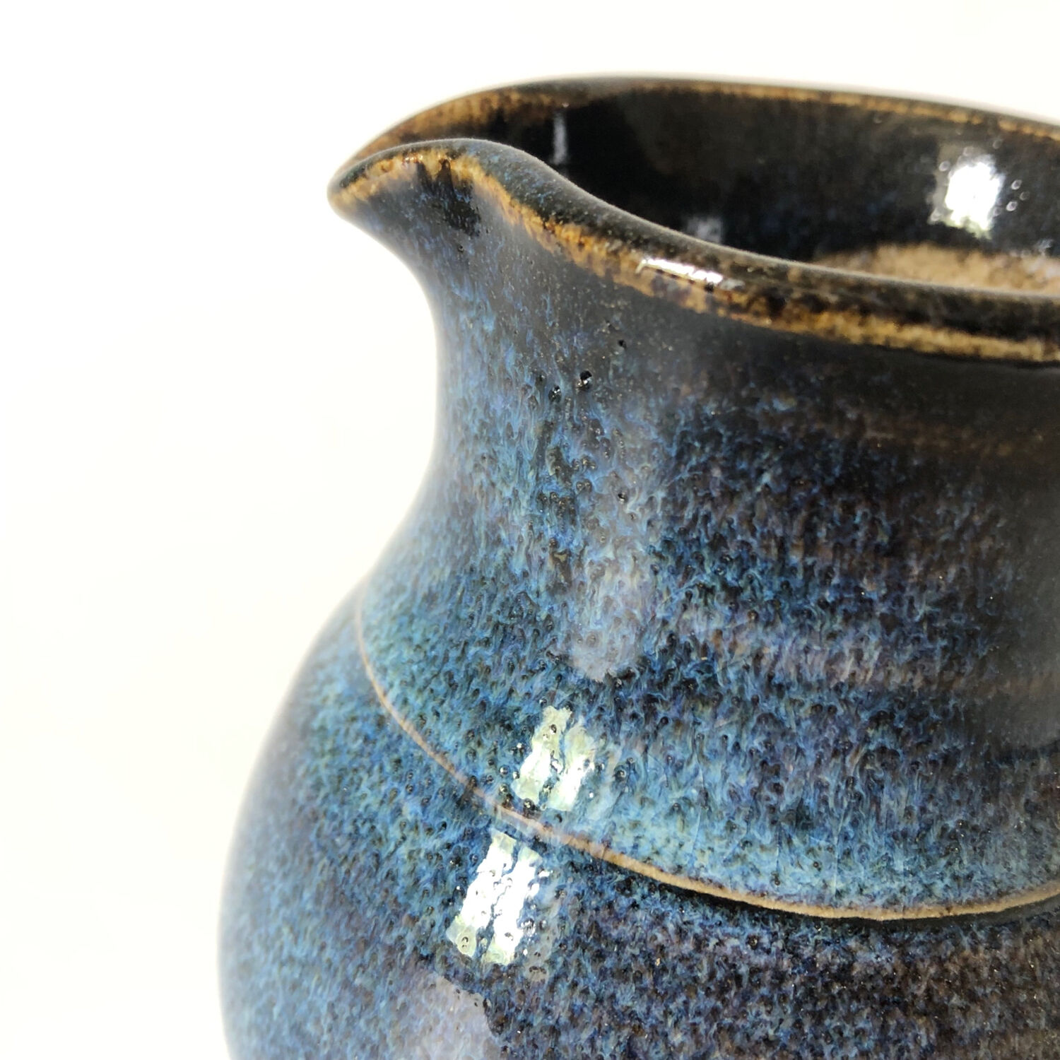 Small pitcher in blue glazed sandstone